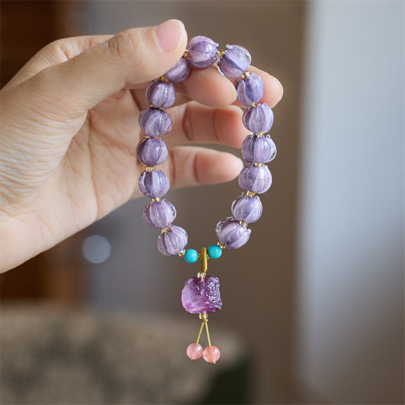 0b1a698b-d5b1-4831-a704-d6dfe60375e7 Buddha Stones Liuli Glass Bead Lotus Design Fluorite Ivory Fruit Dancing Lion Charm Enlightenment Bracelet - Image 1