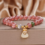 Buddha Stones Natural Strawberry Quartz Money Bag Charm Positive Bracelet