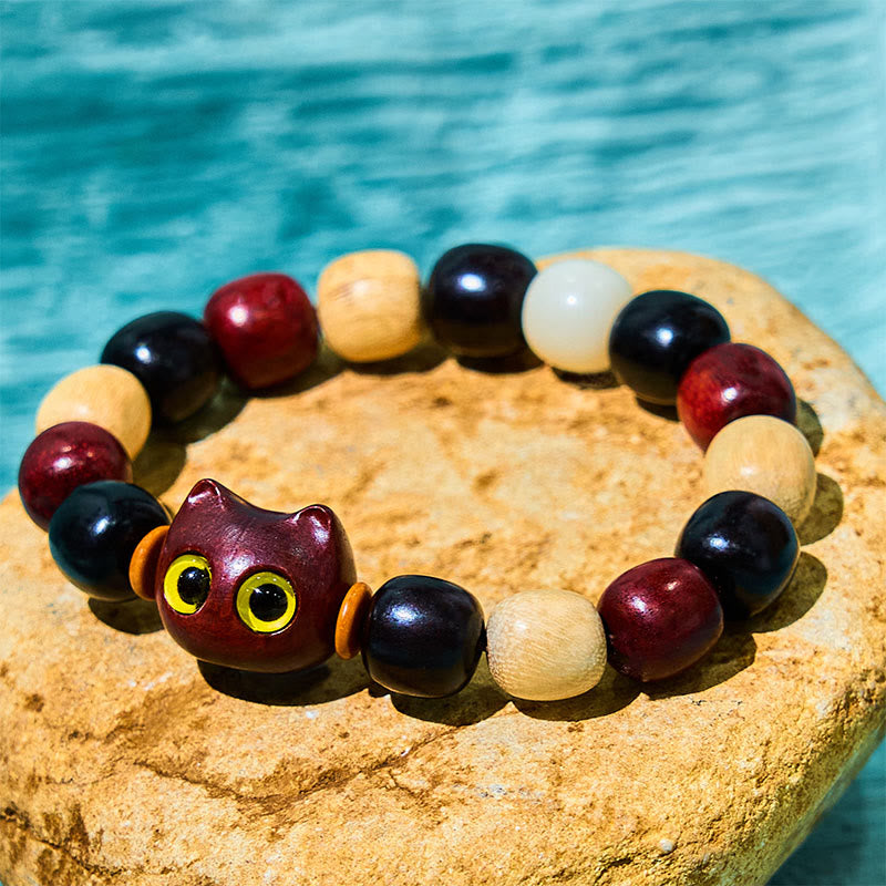 1741156355 Buddha Stones Small Leaf Red Sandalwood Ebony Wood Cute Cat Engraved Protection Bracelet - Image 1