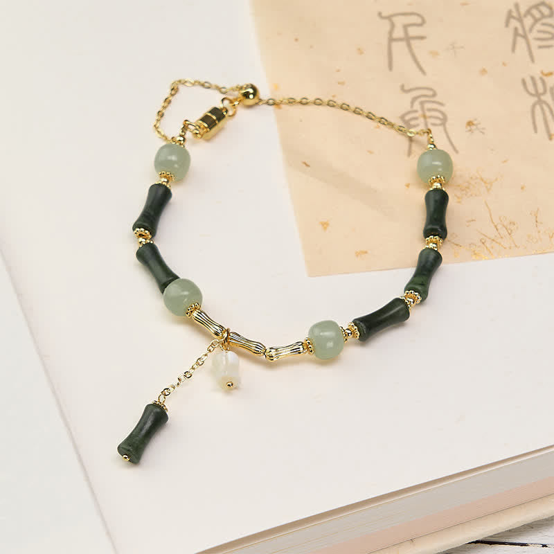1775044957 Buddha Stones Hetian Jade Peridot Bamboo Lily Of The Valley Wealth Faithfulness Adjustable Bracelet - Image 1
