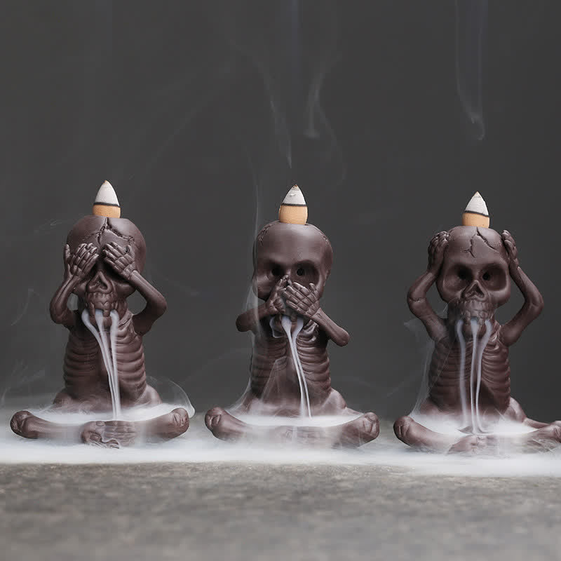 bf152e50-d745-42e2-895b-59f6423f157b.jpg Buddha Stones Little Skull Ghost Purple Clay Backflow Smoke Fountain Peace Incense Burner Decoration