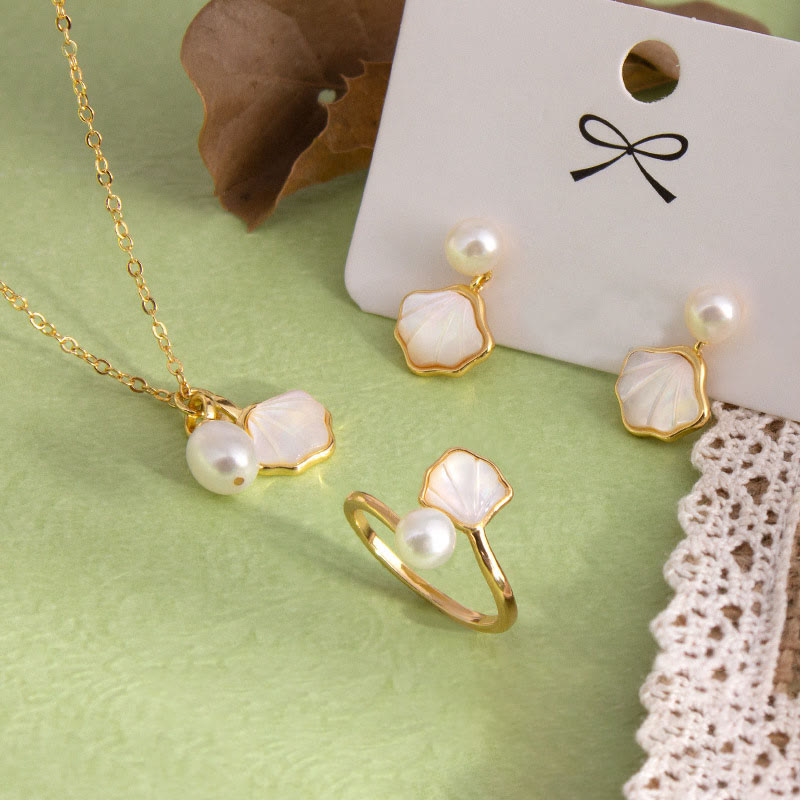 c4e2a1eb9ecd5fe9c47ab5c3ce825bb3 Buddha Stones Ginkgo Tridacna Stone Pearl Bead Copper Blessing Necklace Pendant Ring Earrings Set - Image 1