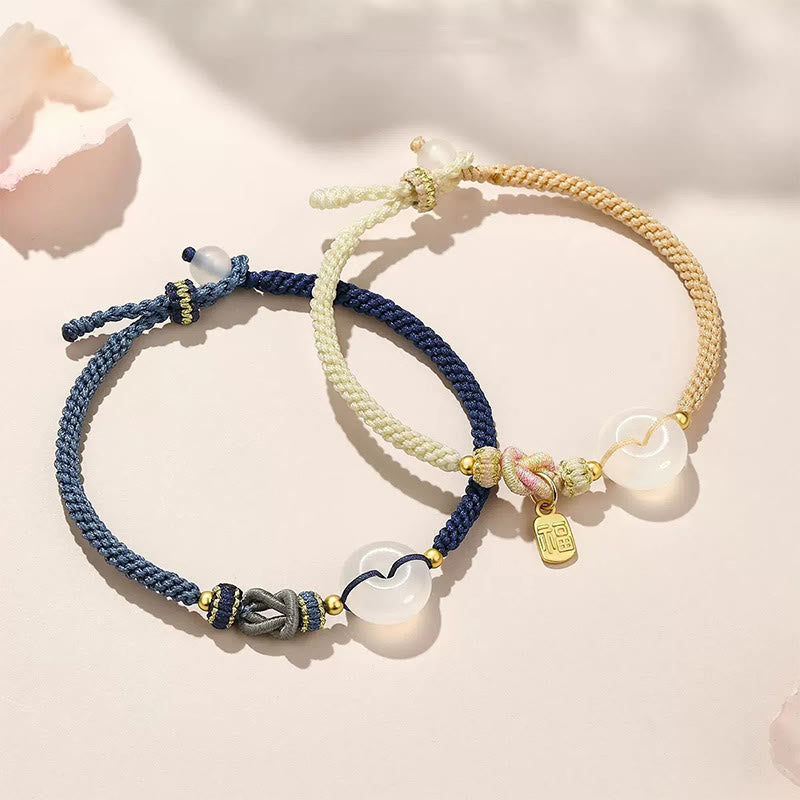 e9a787d6-331f-4bf8-a599-77af1d9be45a_296261ad-dae0-4e1f-b59b-12beb88f421e Buddha Stones Handmade White Agate Peace Buckle Luck Happiness Protection Weave String Bracelet - Image 1